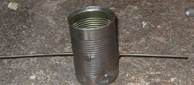 Shoots straight through this can at 150 psi, and keeps on going. These damage pics aren't super creative, but I am pretty much limited to shooting recycling. The rod in there is to show the bb's path, it was not the projectile.