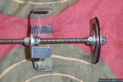 This is a close-up of the upper piston body of my Toolies' style piston in the STAG5. The valve guide is made from 1/32&amp;quot; 22ga steel sheet metal. Upper piston body is made from 5/16&amp;quot; washers, custom fender washers (3/4&amp;quot; SAE washers with 3/8&amp;quot; washers JB Welding in the middle as spacers,) 1/8&amp;quot; sheet metal, and 3/16&amp;quot; rubber gasket material. All held together with 5/16&amp;quot; nylon nuts.