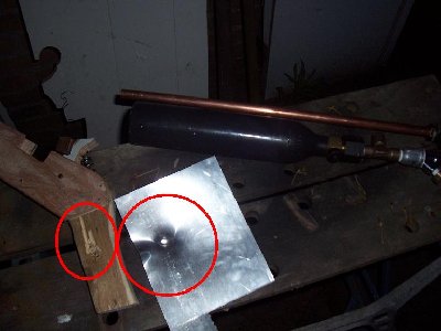 Aluminium plate pretty beat up.I should have clamped it down for penetration!!