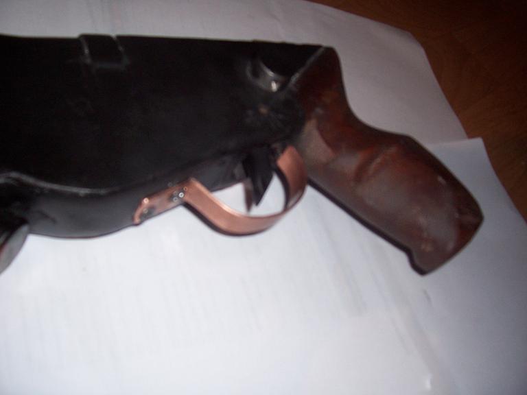 better view of the handle.Handcarved hardwood rocks!