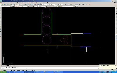 When the gun is pressurized, the chamber being at the bottom of the T.