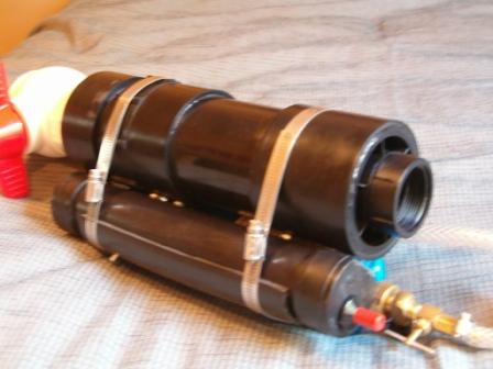 Here is the side showing the electronics tube, igniter, and fan switch