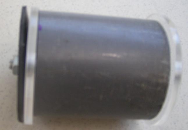 The piston from the side view. From left to right, nutt + washer, rubber disk, 6mm acrylic disk, UPVC JIS AE 3&amp;quot; pipe, 6mm acrylic disk, washer + bolt head.