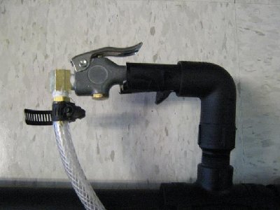 The blowgun is ergonomically inserted in the 3/4&amp;quot; pipe, and held in place with packing tape, which is easily painted:)