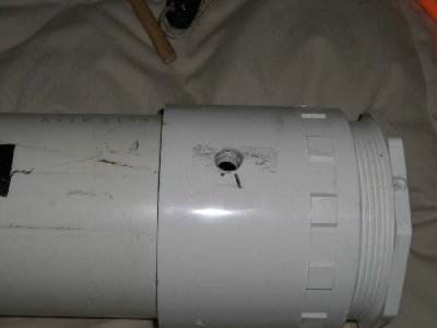 Locate where you want the meter on your cannon. i put mine over the electrodes to trevent shocks.<br />Carefully drill the hole for the tap with the 7/16&amp;quot; bit. Always drill on a joint where the pvc is twice as thick.<br />Take your time and get it streight.