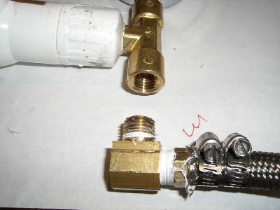 Step 16<br />wrap the hose barb in teflon and thread in to the othe street elbow.