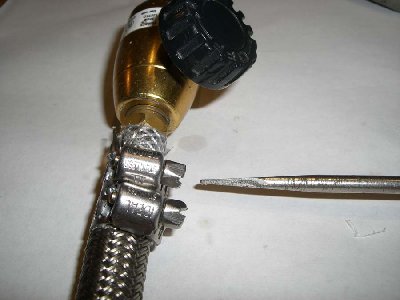 Step 14<br />push the hose onto the torch head and tighten the hose clamps