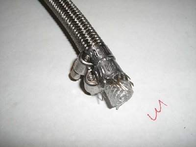 Step 13<br />Put two hose clamps on one end of the hose