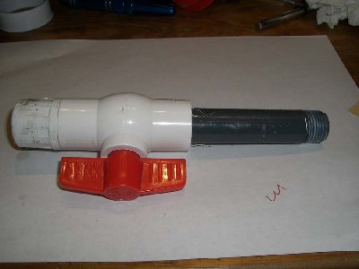 Step 4<br />Wrap the end of the 4 inch long nipple in teflon and thread into the other side of the ball valve