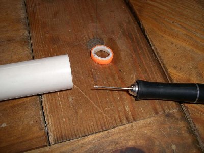 Cut the remaining piece of tube off with an exacto knife