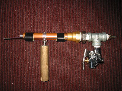 The gun is just 8 3/4'' long without the ramrod in place