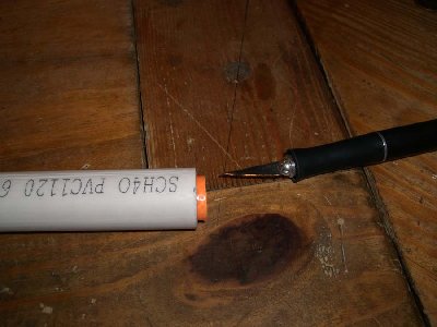 Continue until the hose is almost all the way into the pipe