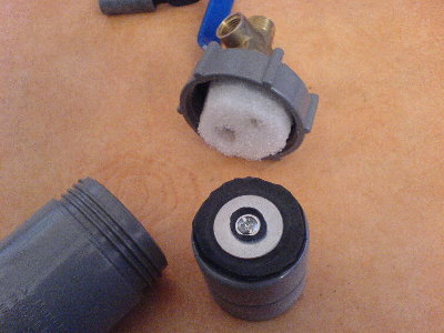 The finished piston and the screw-on cap with bumper.