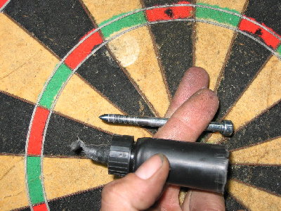 this pic shows a selfdestructed blowdart, the bolt is identical to the one that is buried to the head in the target, it went through .5&amp;quot; of bristtle,.5&amp;quot; of pressboard, 3/8&amp;quot; of backboard, and 5/8&amp;quot; of plywood wall. you can see where the plastic part bottom out on the face of the board before the bolt pulled through.