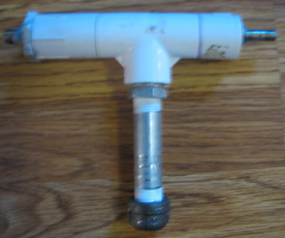 The right part is the shcrader and the left is the 1/8&amp;quot; nipple.