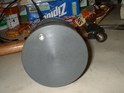 the back of the piston.  the hole for the check valve is in the upper left corner.  its pretty much a 1/8 npt plug and a sweet custom piece we made