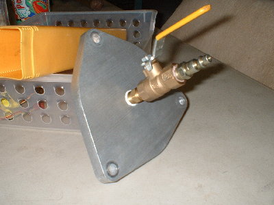 the back of the back attachment.  the ball valve is threaded into the plate