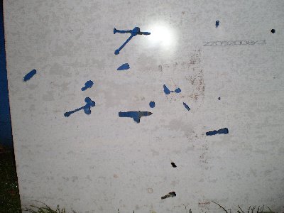 now for some damage i was shooting lots of difrent stuff at somecement sheet