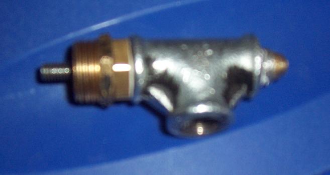 Air comes in from the bottom.Push the button ( rounded capnut) on the right and air will rush out the left side.<br />It's still easy to push open by hand between 500 and 600 psi..