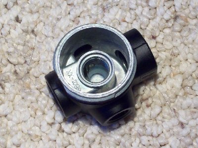 A 1/8&amp;quot; nipple can be screwed into those interior threads, as well.