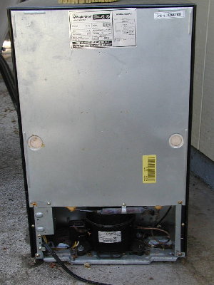 Checking if a fridge has a compressor is like sexing kittens.  Check the back and see what equipment they have. :D .<br />Note this model does not have an external radiator, it's built inside the shell.