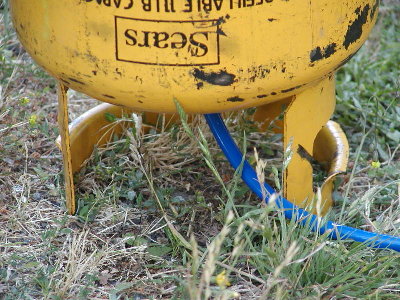 Close up of the purging tank.  Propane is heavier than air, so it is inverted to purge.  Heavy propane exits the bottom as air is added in the top.