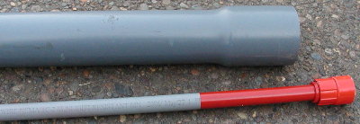 Cut off end of the 2.5 inch conduit barrel..  No markings on the short piece.  Sorry.