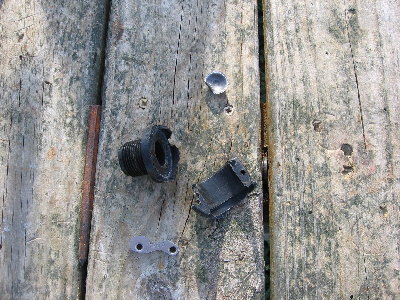 pieces of the old camlock and the plug from safe penetration...
