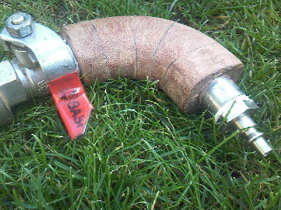 Stacked hardwood rings around the steel bend..glued together...