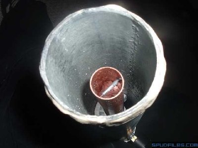 This is the chamber of the MCPAC. You can see the barrel inside, there is a screw in the barrel to stop the ammo from going all the way through and firing early. Also you can see the barrel support a little farther down.