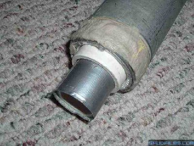 The duct tape wrapped doohickey is the piston itself.