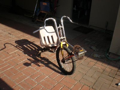 I built the handle bars out of the school chairs legs and some pieces of bike handle bars. I did it this way because my old bars kept bending, and my knees kept hitting them