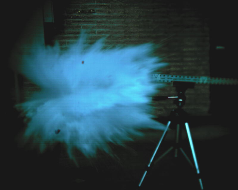 Measuring the speed of the water spray with a slow motion camera.  Initial speed is about 1 foot/sec.