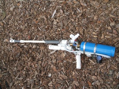 Gun with suppressor attached