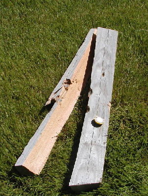 2X4 split with a couple jawbreaker candies.