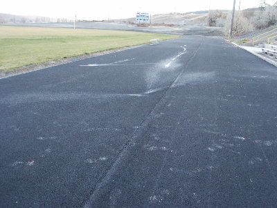 A full Gatoraid landing near the 50 yard line and then bouncing another 15 yards.