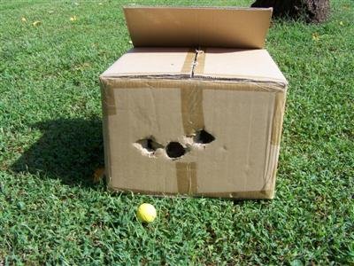 The golf ball dislodged the not-so-spongy foam ball by means of its immense concussive impact!