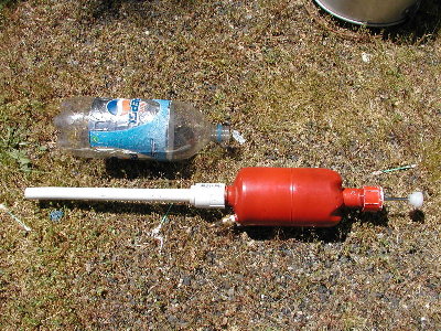 Tank with schrader screwed on with the bottle rocket barrel.  Makes a quick fill from the compressor simple and can be fired without a connected hose.