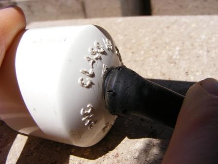 It's not supposed to be damaged like this, but this one was removed forcibly from a metal end cap with a screwdriver and some blunt instruments...