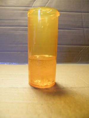 Epoxy piston mold. Old pill bottle.