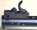 a trigger mech. bolted to the tube <br />- different guns