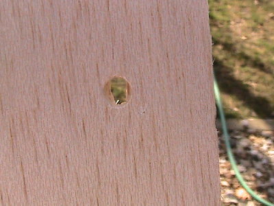 Airsoft BB damage on a board at 120 psi