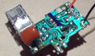 Complete with bad soldering job and capacitor soldered on wrong side of board.