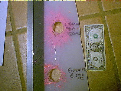 This piece of acrylic is actually two 1/8&amp;quot; pieces back to back. One sheet is white the other clear. This used to be a backlit poster display pannel from where I work. Shot with a frozen PB @ 130 psi 25 ft away(bottom hole) Then shot w/ an<br />unfrozen PB @ 120 psi 25 feet away(top hole). Ouch!! Definitely NOT to be shot at ANY person or creature