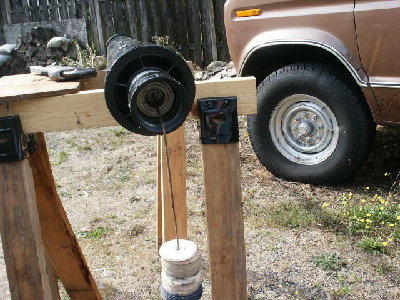 Rope from golf ball, through the bumper, and through the piston with length left over.