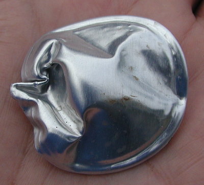 Other side (can inside) of the bottom of the can.