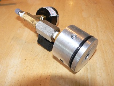 Airspring plug with pressure gauge.
