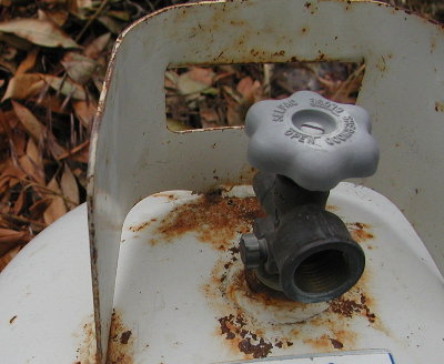 My target was the handle of this propane tank.  I did not use a sharp edge for those shots.  The mystery splat was shot at the side of the tank.