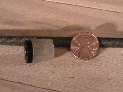 piston with a US penny for size referance.