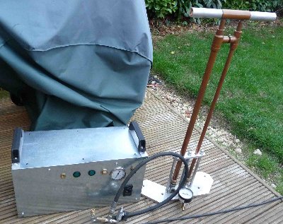 together with it's 'arm powered' brother and shared high pressure hose